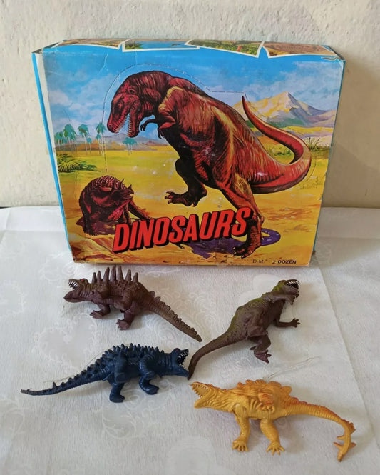 Display box of 24 mixed plastic dinosaurs, original from the 70s and 80s