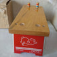 Vintage wooden banquet game for children with hammer and pegs